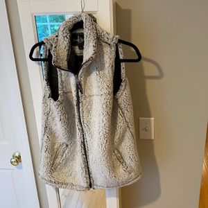 Light grey sherpa vest.